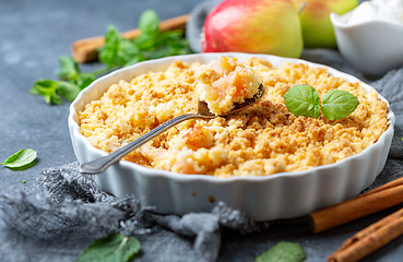 Image showing Apple crumbs with cinnamon. Summer dessert.