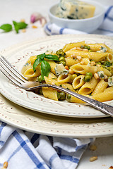 Image showing Delicious vegetarian pasta with green peas sauce.