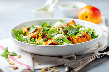 Image showing Salad with nectarines and peppermint pesto sauce.