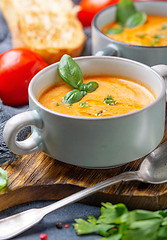 Image showing Delicious tomato soup with spices and herbs.