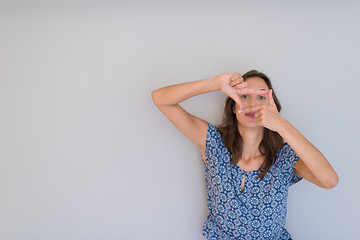 Image showing woman showing framing hand gesture