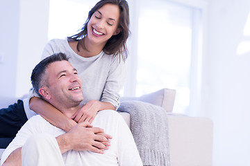 Image showing couple hugging in their new home