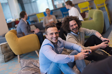 Image showing startup Office Workers Playing computer games