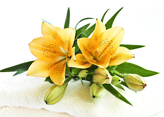 Image showing Stack of towels with flowers