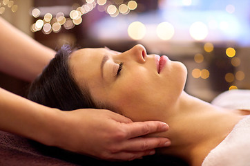 Image showing woman having face and head massage at spa