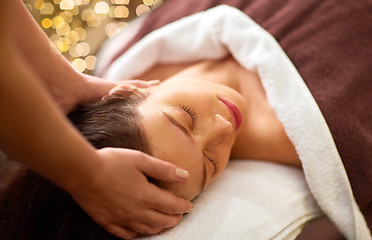 Image showing woman having head massage at spa