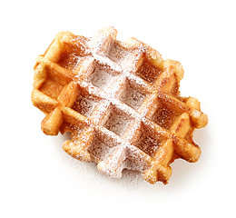 Image showing freshly baked belgian waffle with powdered sugar