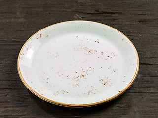 Image showing empty plate on wooden table