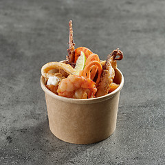 Image showing fried sea food snacks in paper box