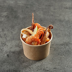 Image showing fried sea food snacks in paper box