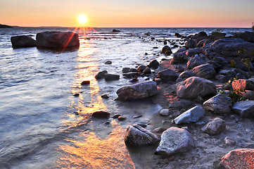 Image showing Sunset over water