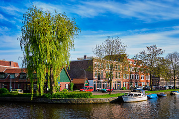 Image showing Boats, houses and canal. Harlem, Netherlands