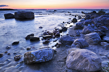 Image showing Sunset over water