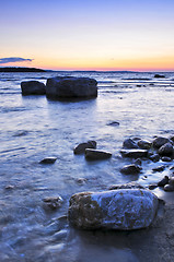 Image showing Sunset over water