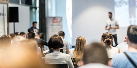 Image showing Male business speaker giving a talk at business conference event.