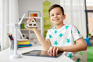 Image showing boy with tablet, toy house and wind turbine