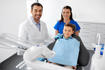 Image showing dentists and kid patient at dental clinic