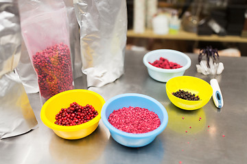 Image showing berries in bowls at confectionery shop kitchen