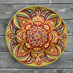 Image showing Decorative ceramic plate, hand painted dot pattern with acrylic 