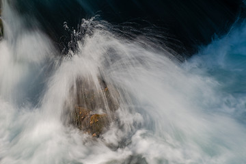 Image showing single stone in wild river