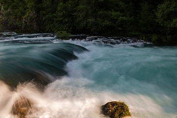 Image showing single stone in wild river