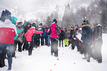 Image showing group of young people having blindfolded games competition