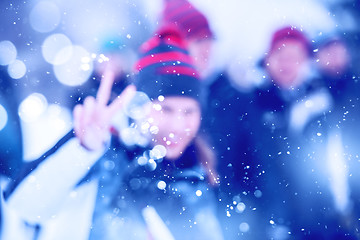 Image showing Abstract blurred photo of young woman in beautiful winter landsc