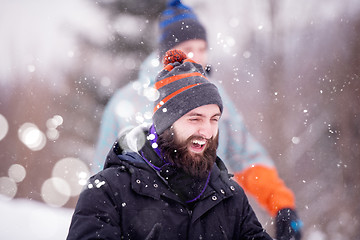 Image showing portrait of young man in beautiful winter landscape