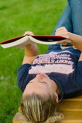 Image showing woman reading in the park