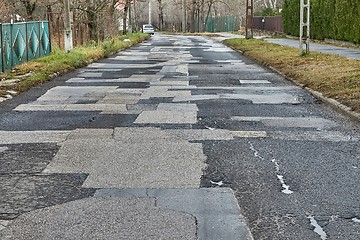 Image showing Patched broken road