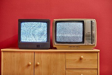 Image showing Two old TV sets