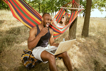 Image showing Young multiethnic international couple outdoors