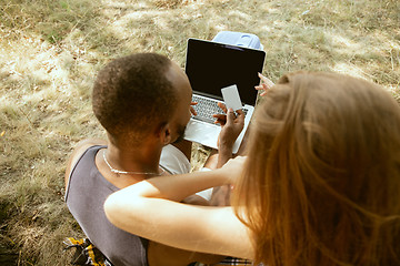 Image showing Young multiethnic international couple outdoors