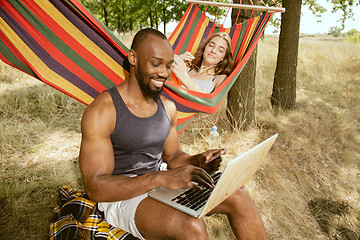 Image showing Young multiethnic international couple outdoors