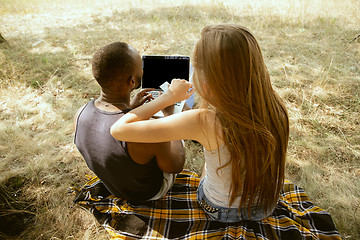 Image showing Young multiethnic international couple outdoors