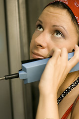 Image showing girl having a call on a telephone