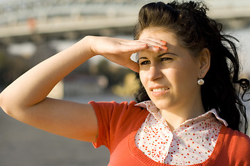 Image showing woman looking at river water