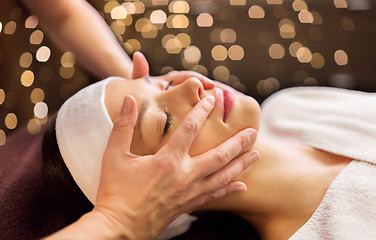 Image showing woman having face and head massage at spa