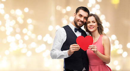 Image showing happy couple with red heart on valentines day