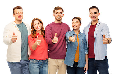 Image showing group of smiling friends showing thumbs up