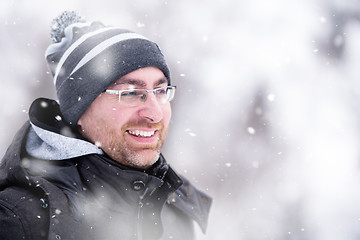 Image showing Portrait of young man on snowy winter day