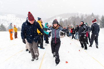 Image showing group of young people having blindfolded games competition