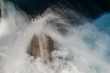 Image showing single stone in wild river