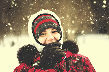 Image showing Portrait of young woman on snowy winter day