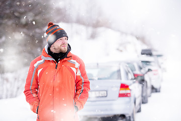 Image showing Portrait of young man on snowy winter day