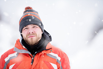 Image showing Portrait of young man on snowy winter day