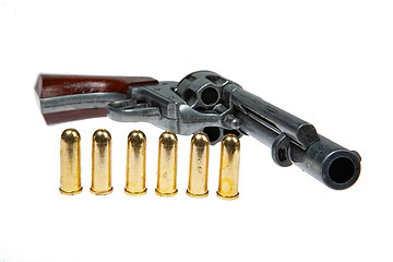 Image showing Old Revolver And Cartridges