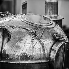 Image showing Reflection of a mast in an old ship compass, closeup. Black and 