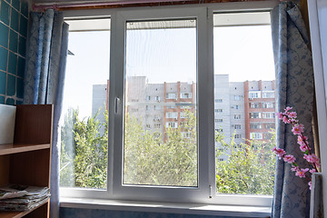 Image showing Glazed plastic windows loggia apartment high-rise building