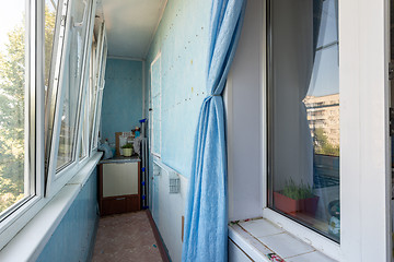 Image showing The interior of the glazed spacious balcony of the apartment